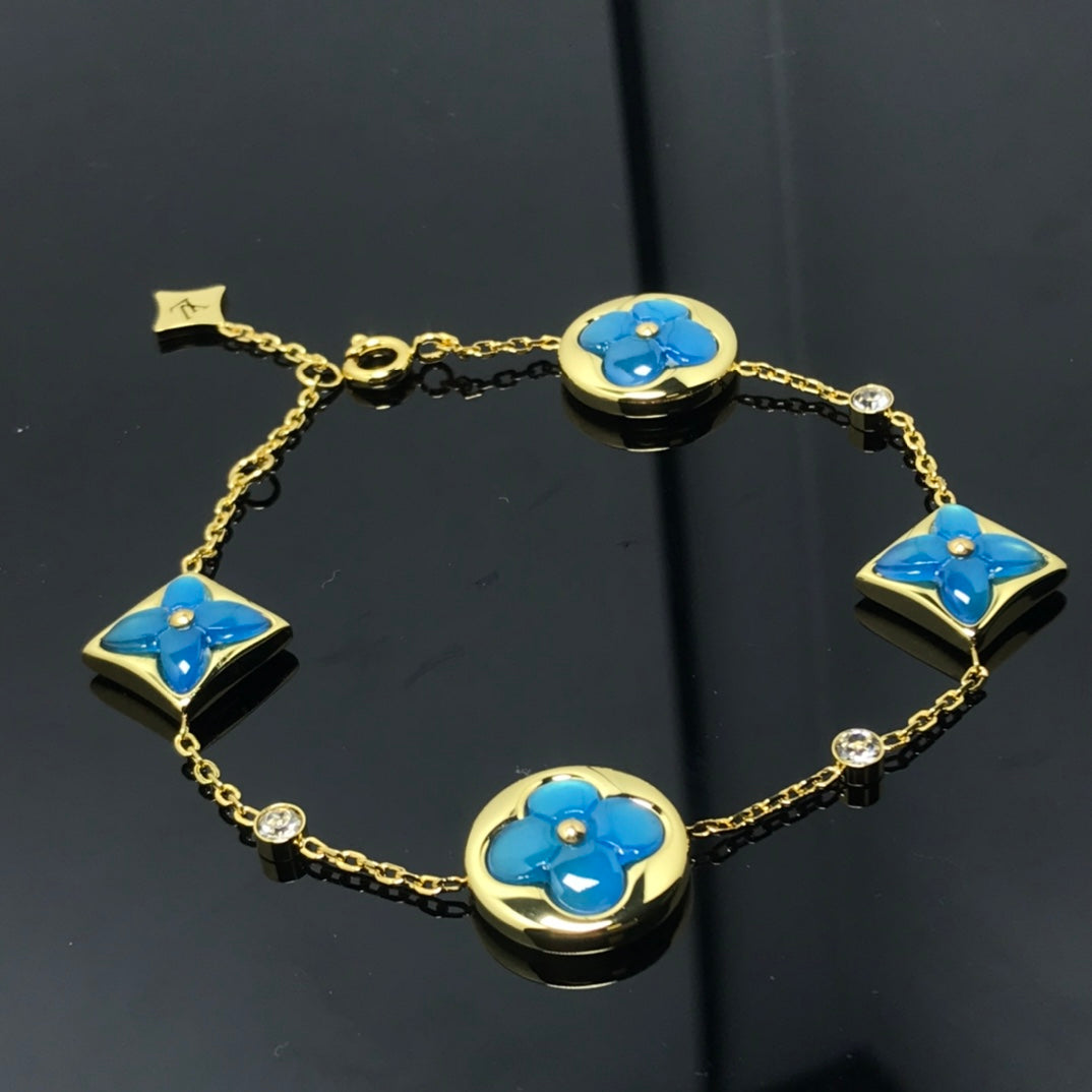 ¡®Jewelicorn¡¯STAR AND SUN 4 MOTIF BLUE BRACELET